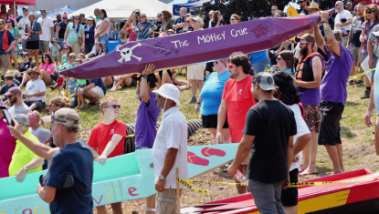 Cardboard boats entering water